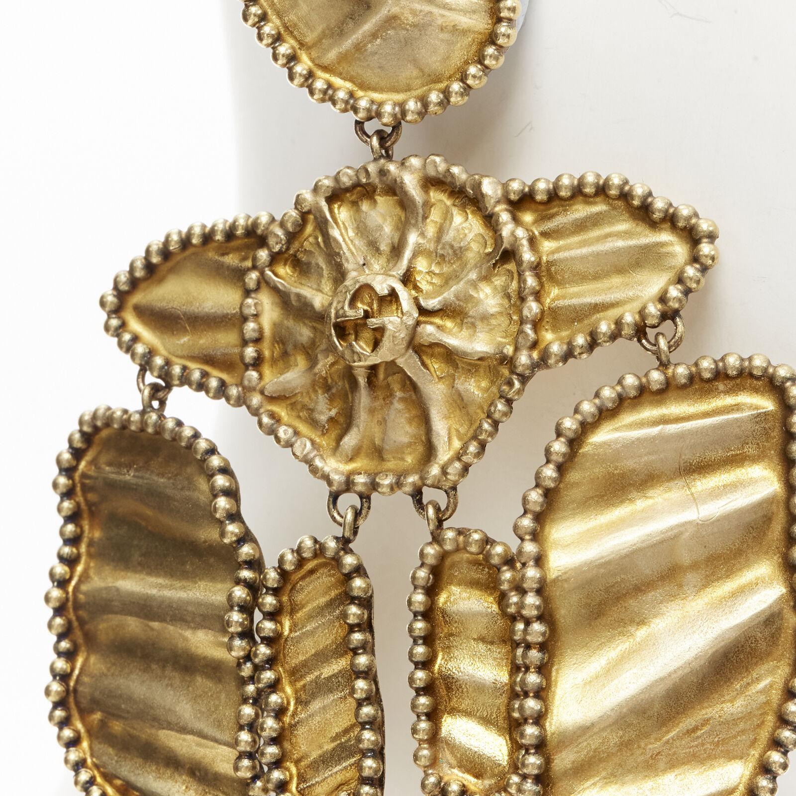 GUCCI ALESSANDRO MICHELE antique gold tone aboriginal tribal GG clip on earrings 1