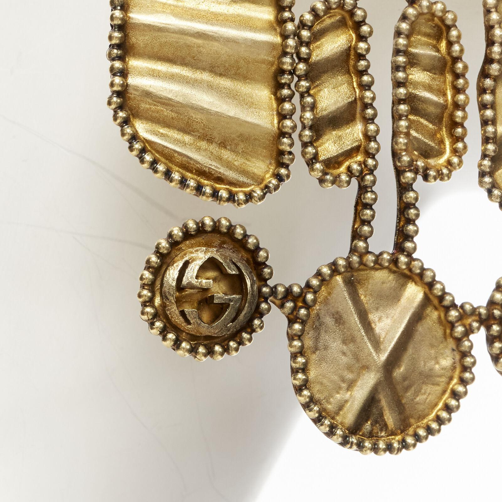 GUCCI ALESSANDRO MICHELE antique gold tone aboriginal tribal GG clip on earrings 2