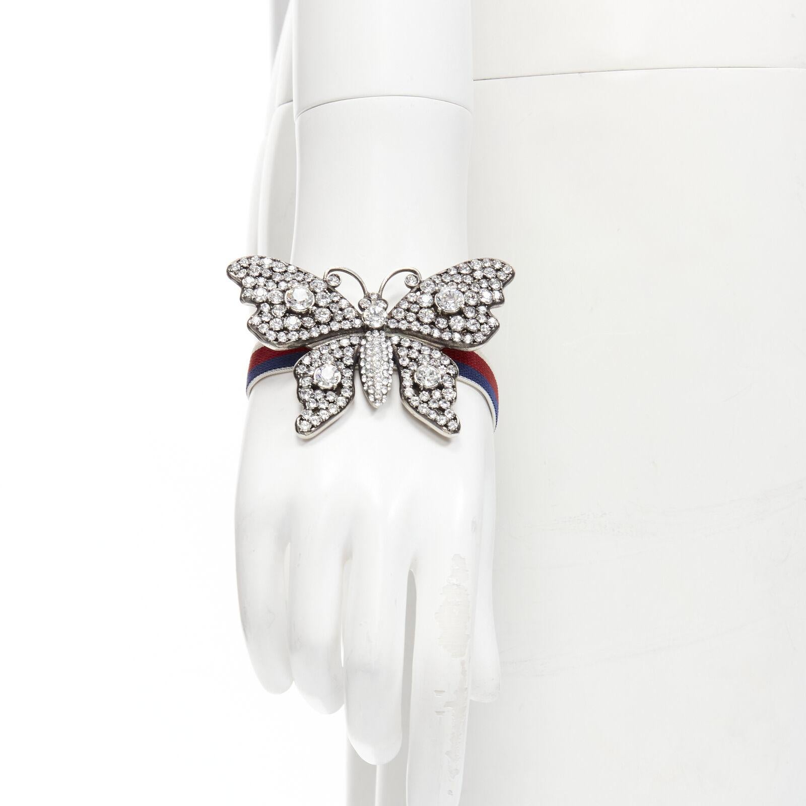 GUCCI ALESSANDRO MICHELE antique silver crystal Butterfly web strap bracelet
Reference: TGAS/C01500
Brand: Gucci
Designer: Alessandro Michele
Model: 504656 I3N78 8518
Material: Metal, Fabric
Color: Silver
Pattern: Solid
Closure: Stretchy
Extra