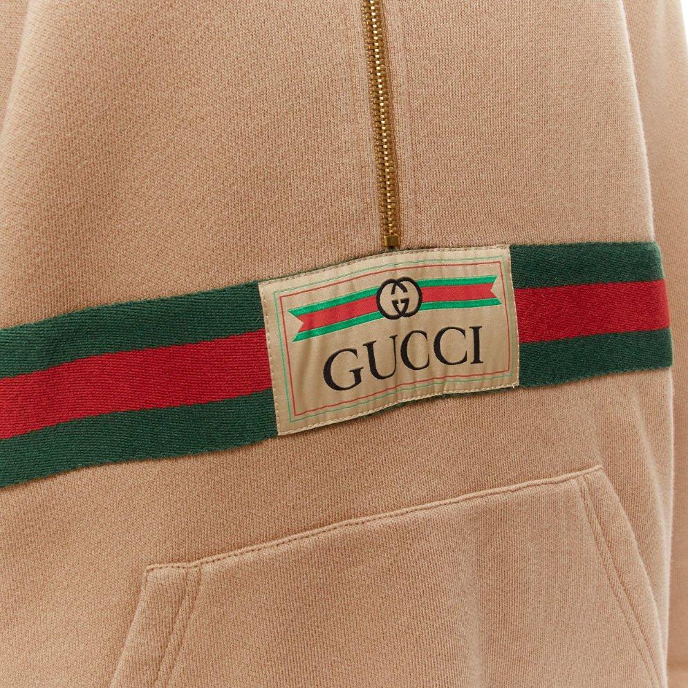 GUCCI Alessandro Michele beige cotton half zip vintage logo pullover XS
Reference: LNKO/A02246
Brand: Gucci
Designer: Alessandro Michele
Model: 644656 XJC3W 2603
Material: Cotton
Color: Beige, Multicolour
Pattern: Striped
Closure: Half Zip
Lining:
