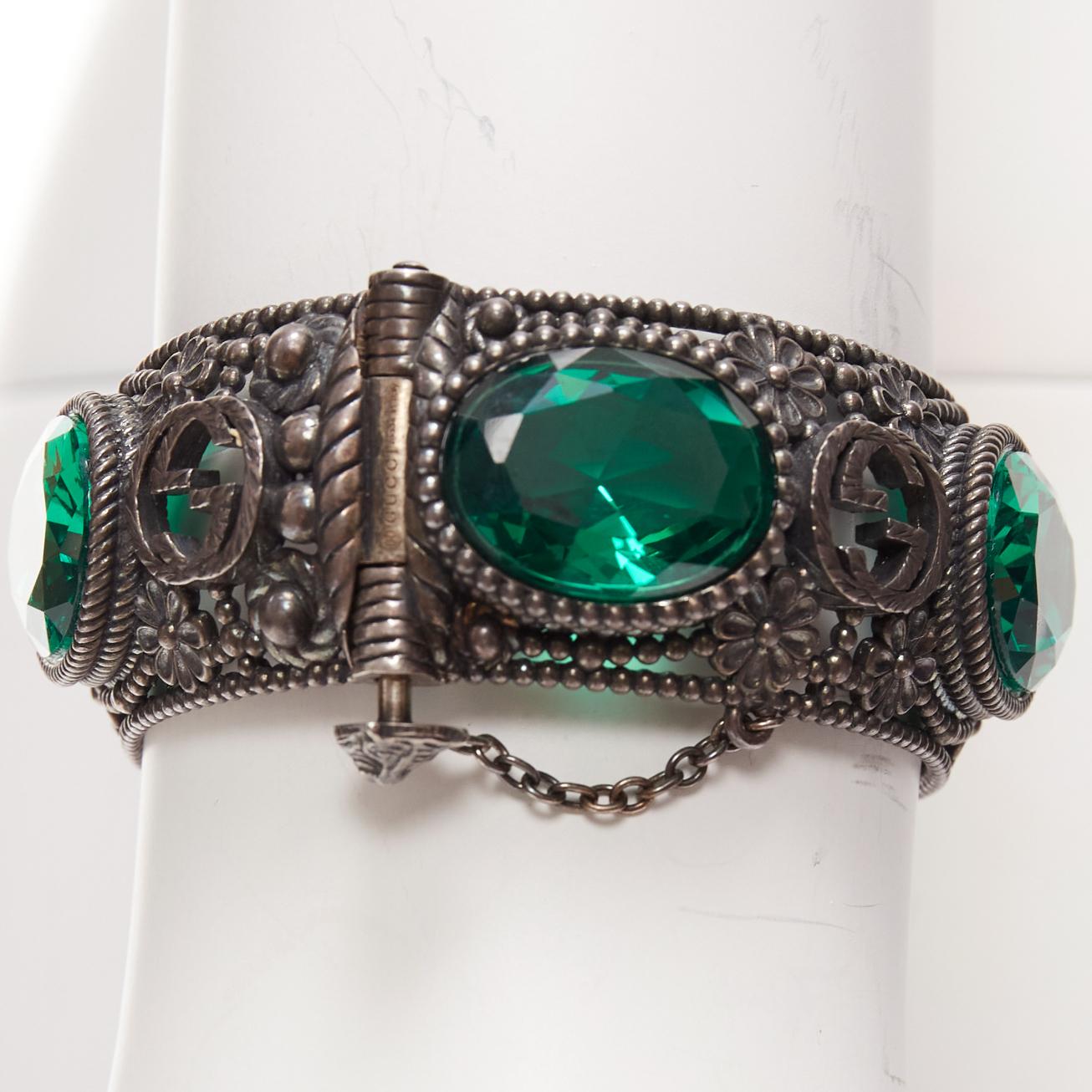 GUCCI Alessandro Michele GG logo green crystal antique gunmetal bangle
Reference: TGAS/C01652
Brand: Gucci
Designer: Alessandro Michele
Model: 53791j8845 8133
Material: Metal
Color: Green, Silver
Pattern: Crystals
Extra Details: Blackened antique