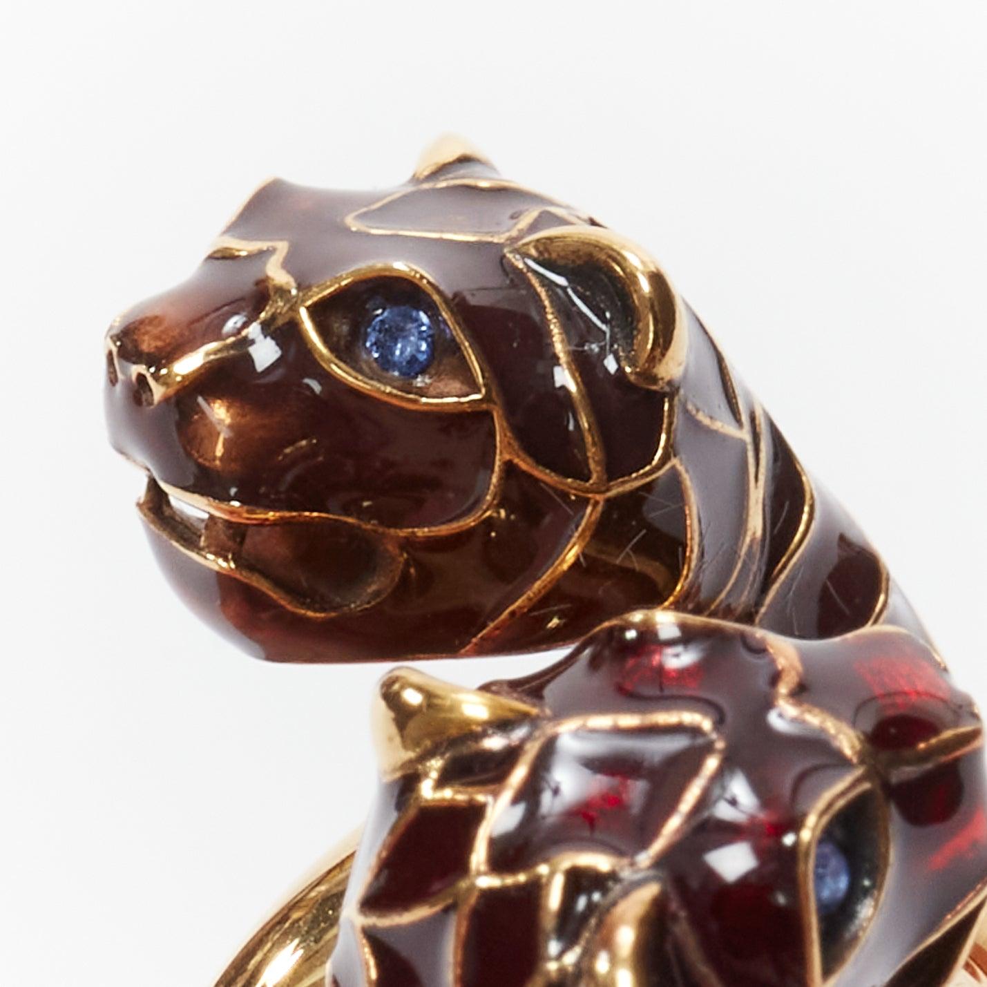 GUCCI Alessandro Michele gold double tiger head enamel crystal ring Sz10
Reference: BSHW/A00125
Brand: Gucci
Designer: Alessandro Michele
Material: Metal
Color: Gold, Multicolour
Pattern: Solid
Closure: Pull On
Lining: Metallic Metal
Made in:
