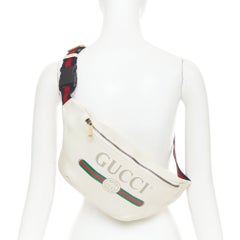 GUCCI Alessandro Michele off white vintage logo print leather crossbody belt bag