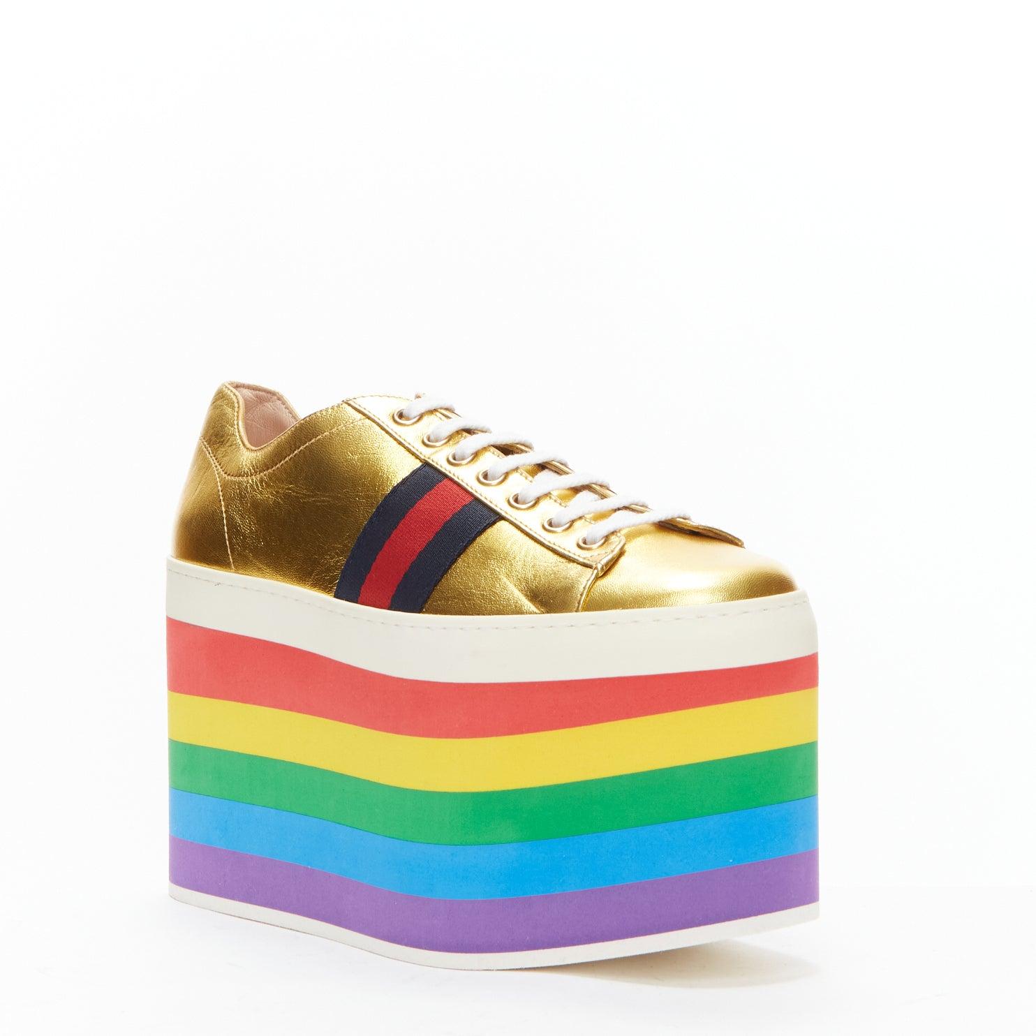 GUCCI Alessandro Michele Peggy rainbow gold web platform sneakers EU37.5
Reference: TGAS/D00627
Brand: Gucci
Designer: Alessandro Michele
Model: Peggy
Material: Leather, Fabric, Foam
Color: Multicolour, Gold
Pattern: Striped
Closure: Lace Up
Lining: