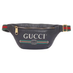 GUCCI  Alessandro Michele vintage logo print web strap small crossbody belt bag
