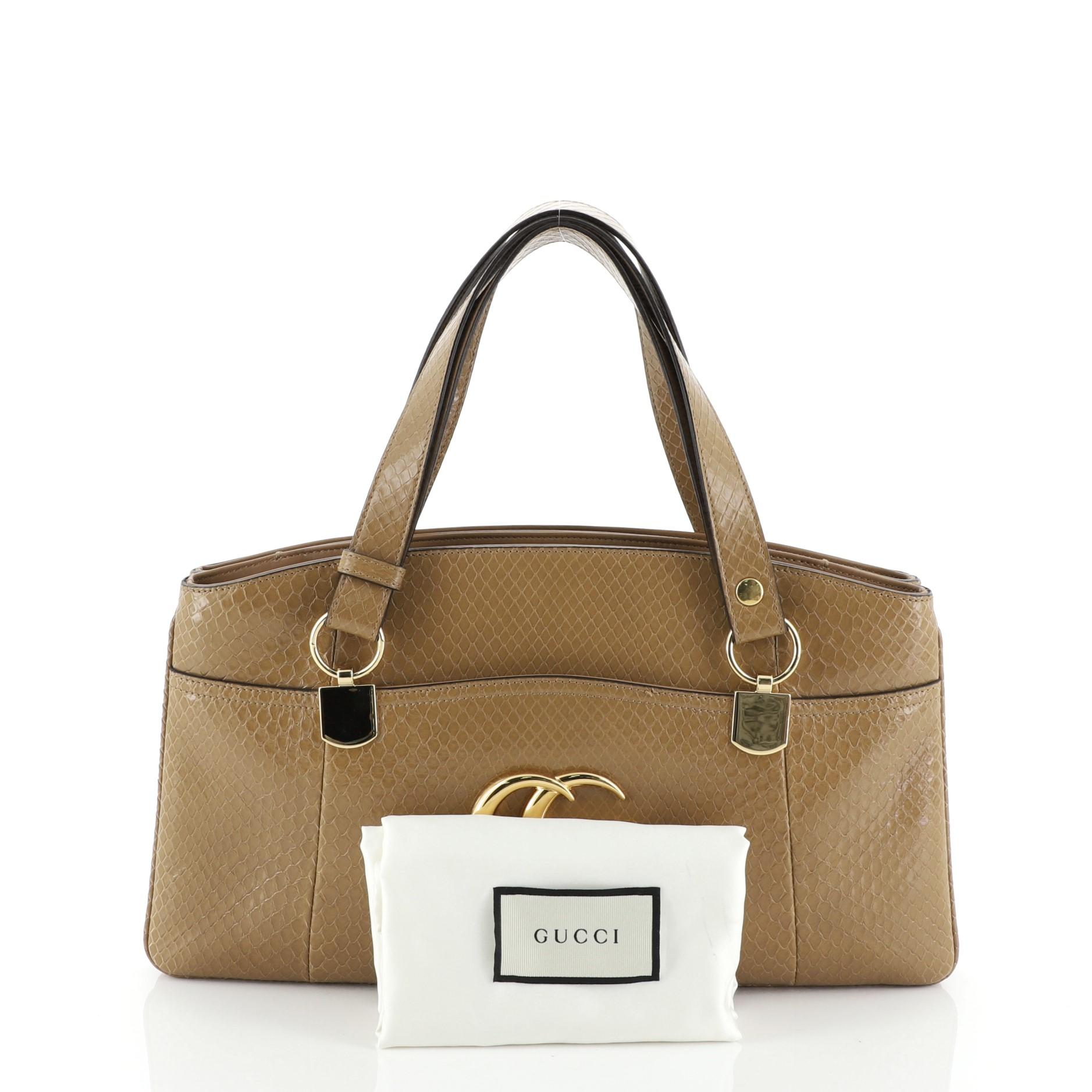 Estimated Retail Price: $4,900
Condition: Excellent. Slight creasing on handles, small marks on interior pockets, light scratches on hardware.
Accessories: Dust Bag
Measurements: Handle Drop 8