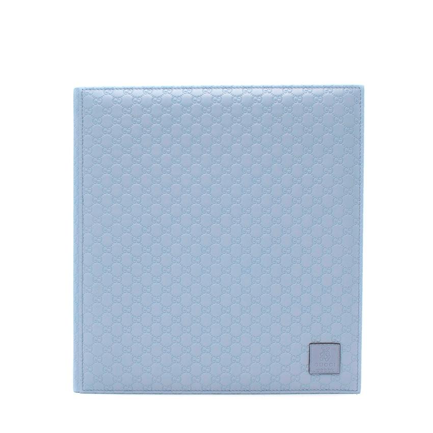 Gucci Baby Blue Microguccissima Leather Bound Baby Photo Album

- Beautiful light baby blue leather-bound album
- Embossed in the signature microguccissima pattern with a Gucci Kids Patch
- 30 leaves of creamy white card
- Brand new in box
- Perfect