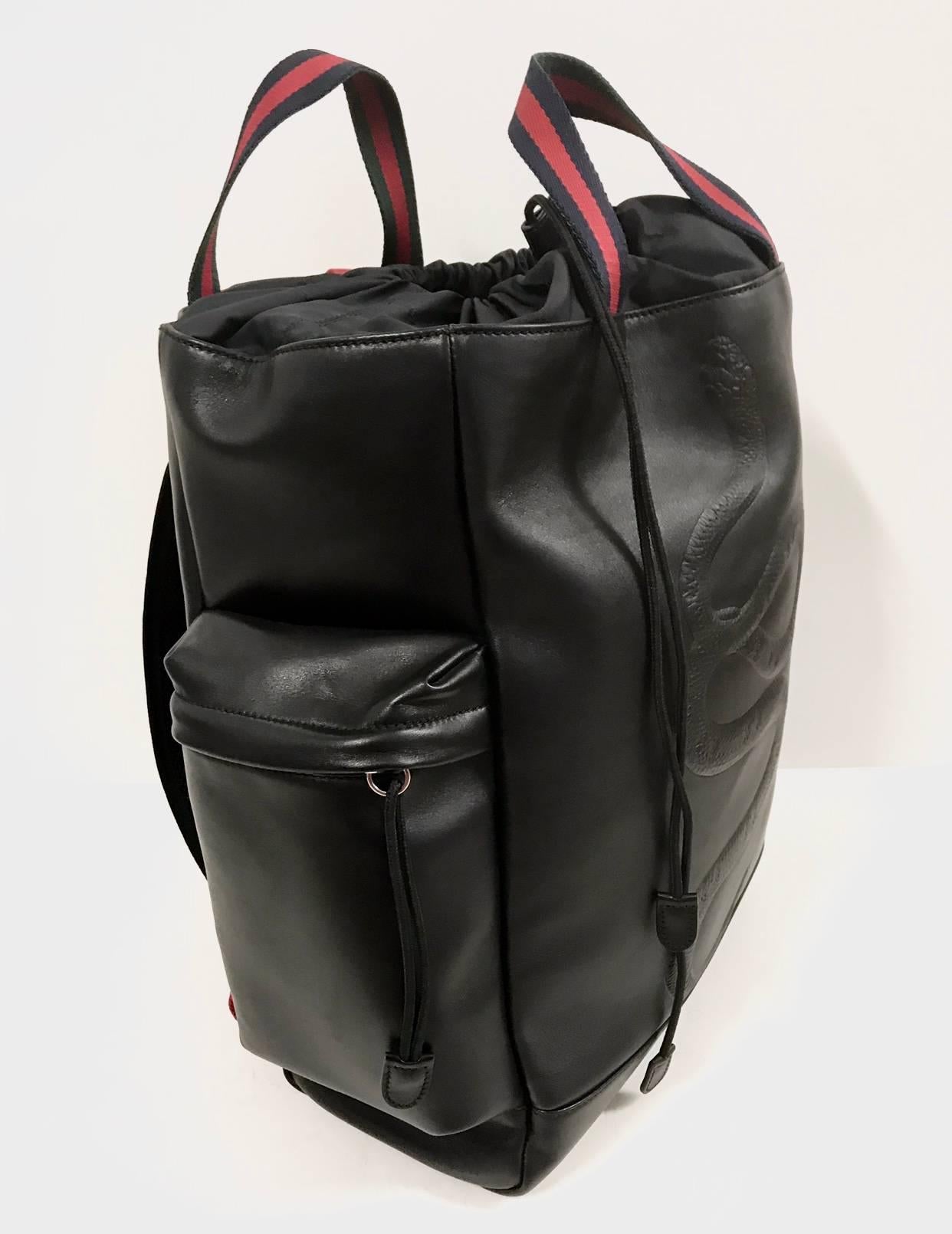 Gucci 
Backpack for men's

Collection FW17
Leather material
Black colour
Fabric parts and braces with red and green web
Measures L34cm x A42cm x P16cm
New condition
Packaging dust bag and certificate of authenticity
Fast delivery DHL EXPRESS

Retail