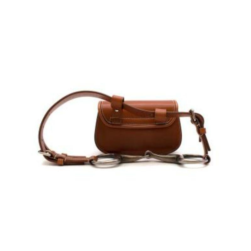Gucci Gucci Bamboo 1947 mini belt bag
 
 
 
 -Antique silver-toned and bamboo hardware
 
 -Horsebit detail
 
 -Adjustable leather strap 
 
 -Turn lock fastening 
 
 -This mini belt bag is adorned with two straps allowing it to be carried on the