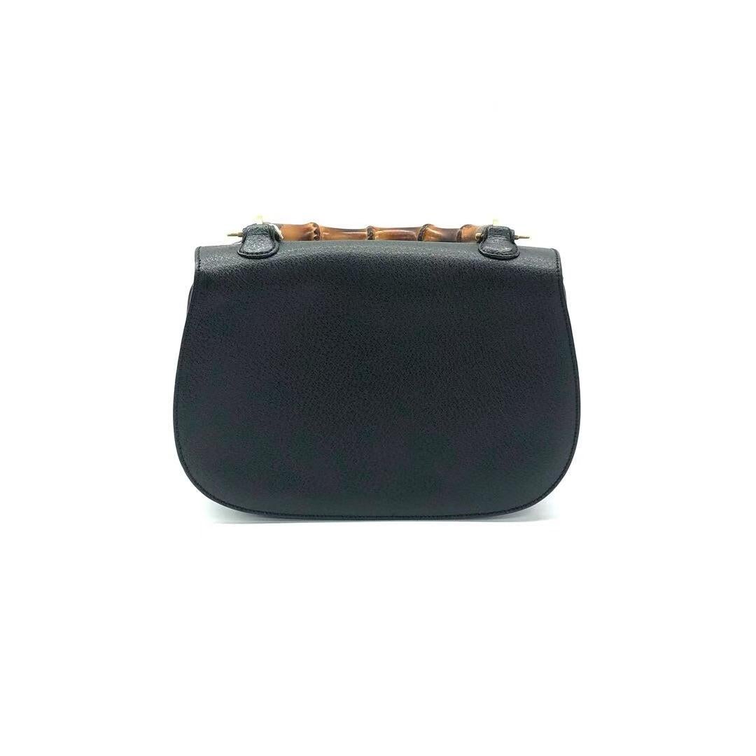 Gucci Bamboo 1947 Top Handle Bag Leather Medium Black
 These are professional photos of the actual bag.
 This Gucci crossbody bag has the signature oval design with the bamboo turn lock.
 CONDITION: EXCELLENT
 This preloved / preowned Gucci bamboo