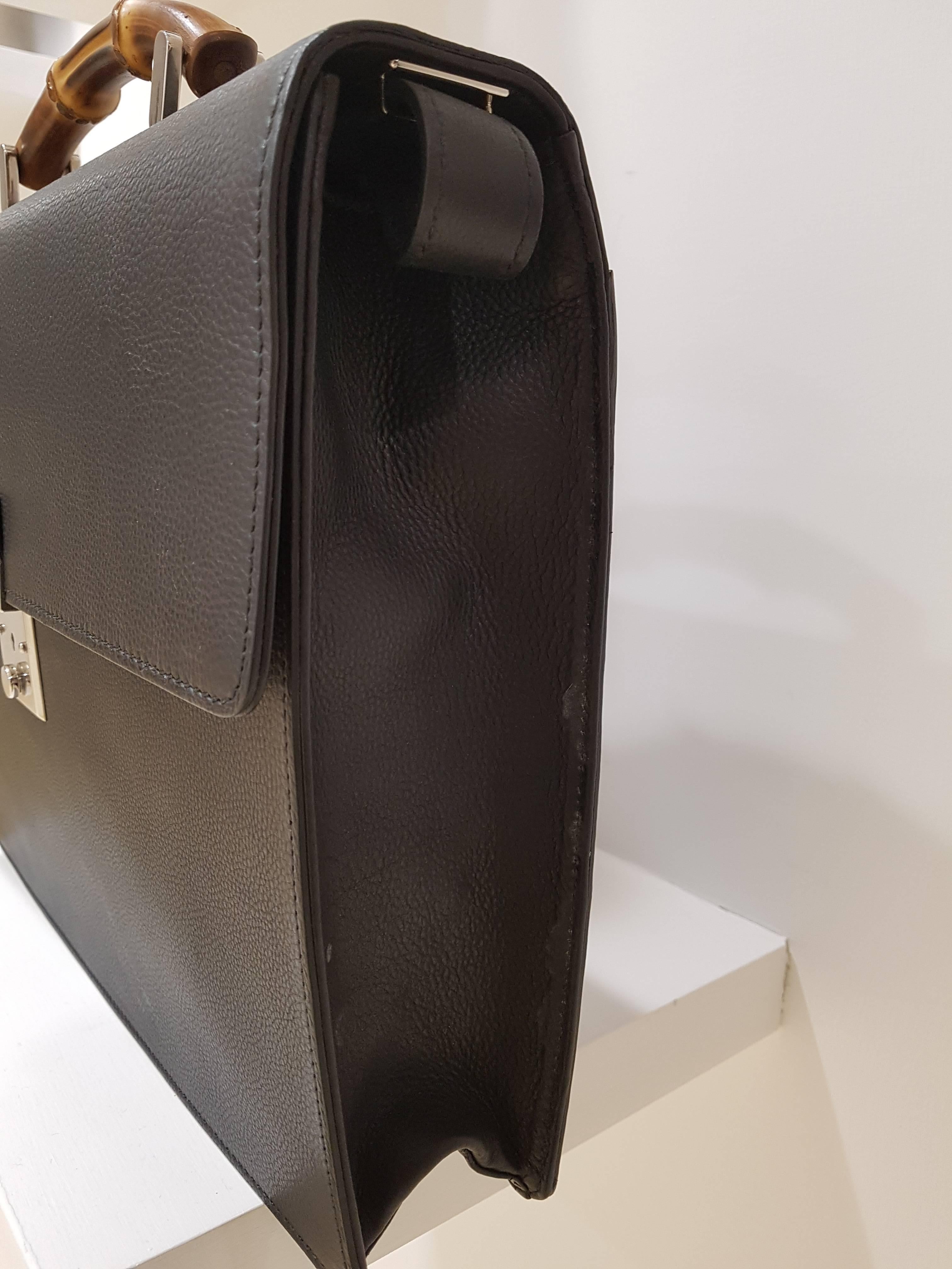 Gucci Bamboo Black Leather Case NWOT

Unworn case made in italy by Gucci
on the back there is a pocket in the inside 2 more pockets

bag is unworn still with cards and dust bag