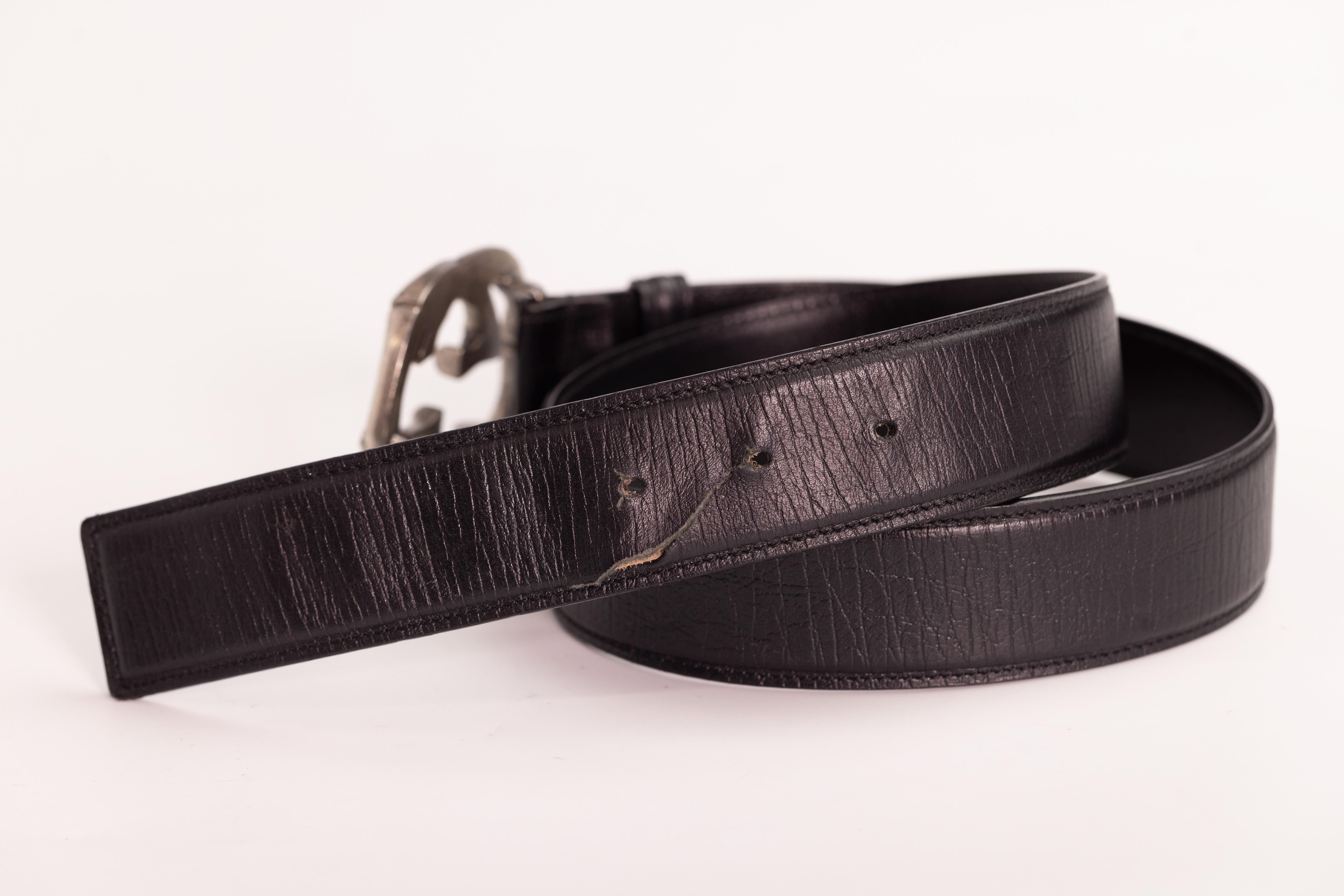 Gucci belt black leather.  Interlocking gg logo buckle with gunmetal hardware. Bamboo accents. Peg-in-hole closure.

Color: Black
Material: Leather with bamboo 
Model No.: 146438
Size: 80 cm / 32 inch
Measures: L 35,5” x W 1.5”
Comes With: No brand