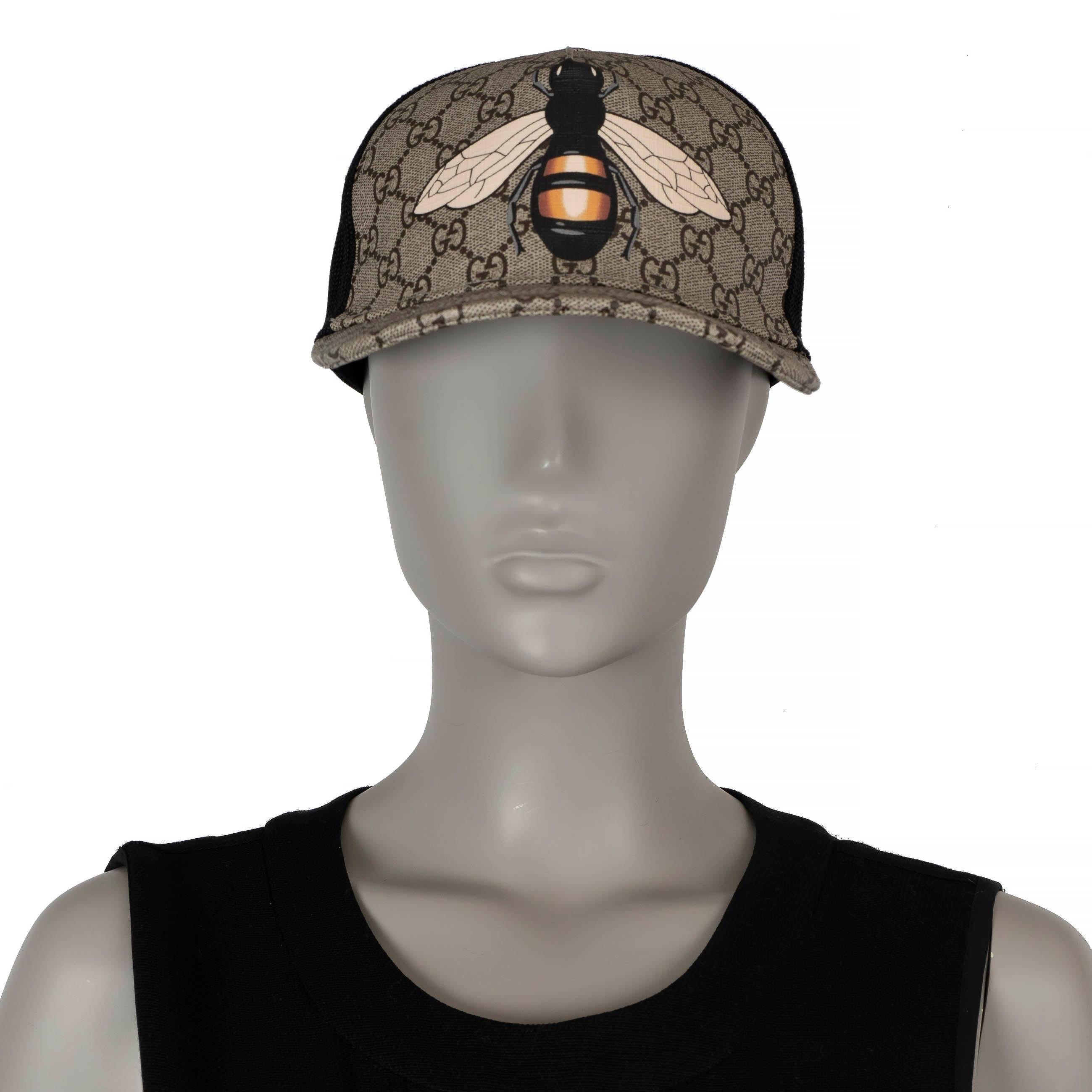 This 100% authentic Gucci baseball cap is crafted from beige and ebony GG Supreme cotton-blend canvas, featuring a playful bee print. The design includes a black mesh back for breathability and an adjustable Velcro closure with signature web trim,
