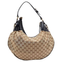 Gucci Medium Full Moon Hobo aus Segeltuch und Lackleder in Beige/Schwarz GG Medium