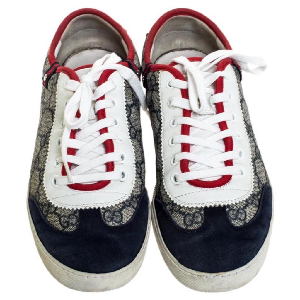 Essay your high-style in these super-stylish sneakers from the house of Gucci! They are carefully crafted from GG Supreme canvas and leather, and designed with suede panels and lace-ups. You are sure to receive both comfort and fashion when you