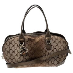 Gucci Beige/Bronze Metallic GG Canvas Heart Bit Top Handle Bag For Sale at  1stDibs | bronze gucci bag, reseller gucci london