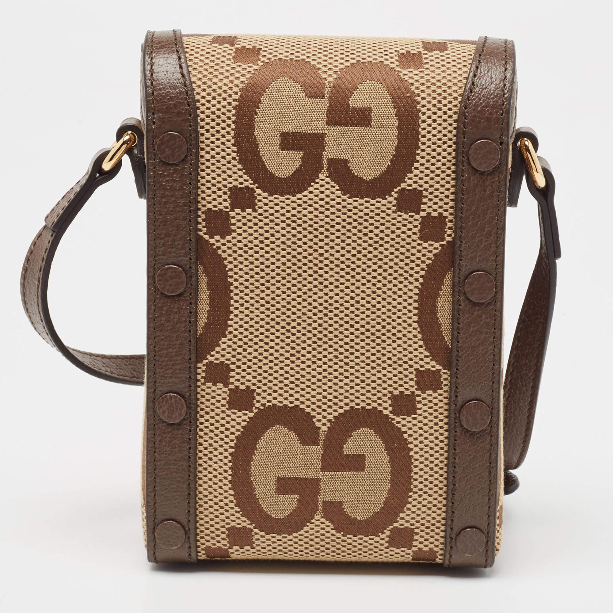 The Gucci Horsebit 1955 Crossbody Bag is an exquisite blend of luxury and sophistication. Crafted with the iconic GG canvas and supple leather, it features the signature horsebit detail, epitomizing timeless elegance. Its versatile crossbody design