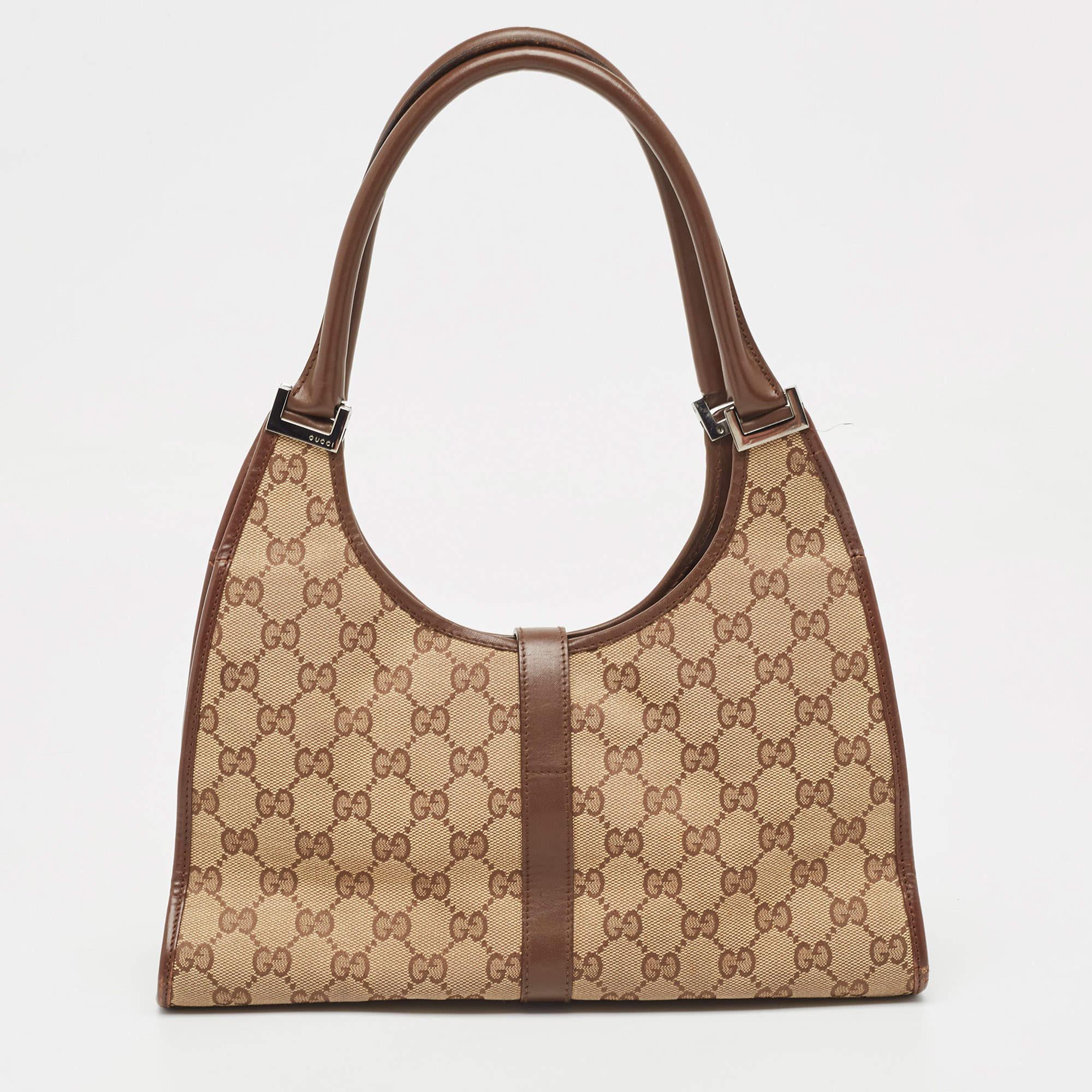 Indulge in timeless luxury with this Gucci bag. Meticulously crafted, this iconic piece combines heritage, elegance, and craftsmanship, elevating your style to a level of unmatched sophistication.

