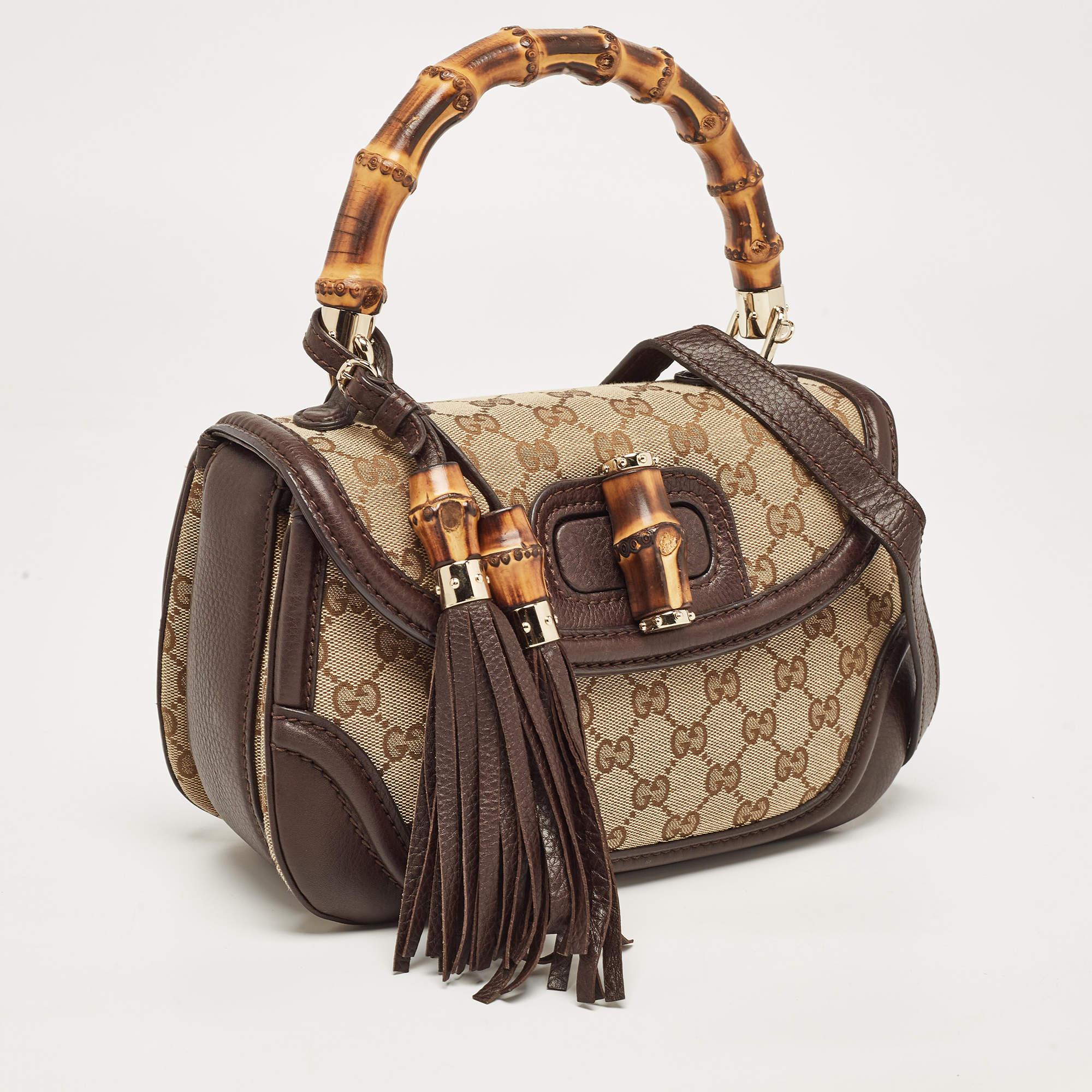 Gucci Beige/Brown GG Canvas and Leather Tassel New Bamboo Top Handle Bag In Excellent Condition For Sale In Dubai, Al Qouz 2