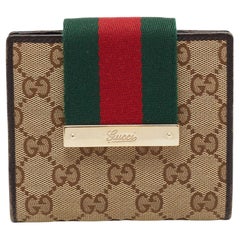 Französische Gucci-Brieftasche aus Segeltuch und Leder mit Webklappe in Beige/Braun