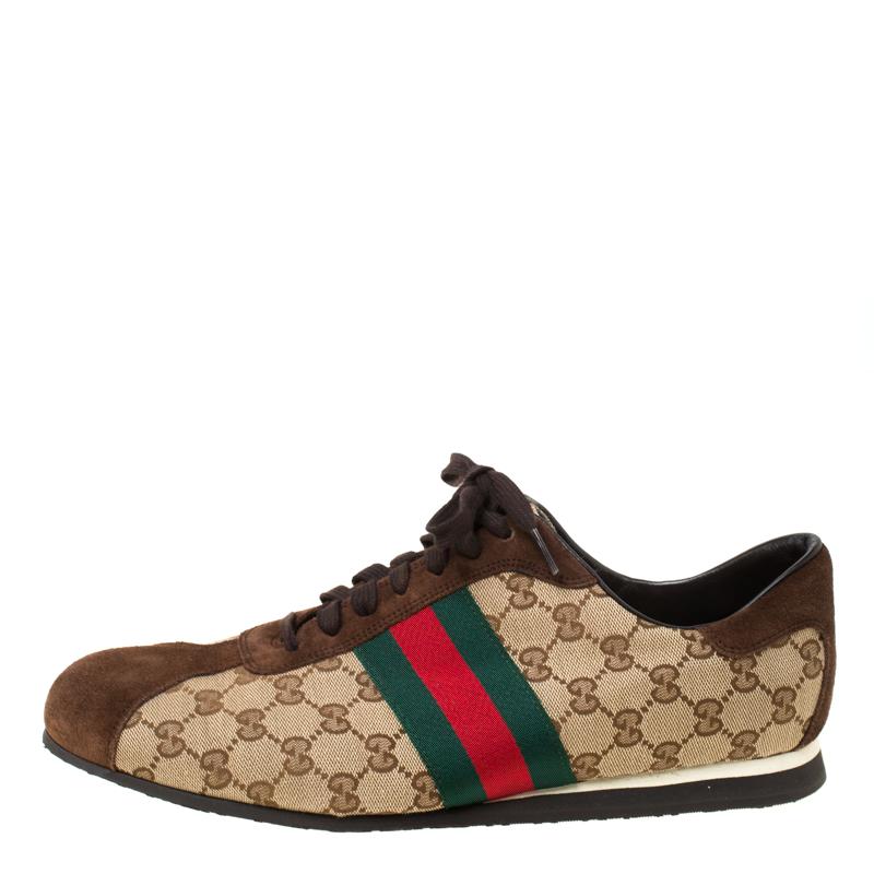 Step into these Gucci sneakers for instant comfort! They feature the iconic Gucci Web detail and suede trims on the GG canvas exterior. They are lined with leather and finished with lace-ups. Pair these with casuals for a sporty and fashionable