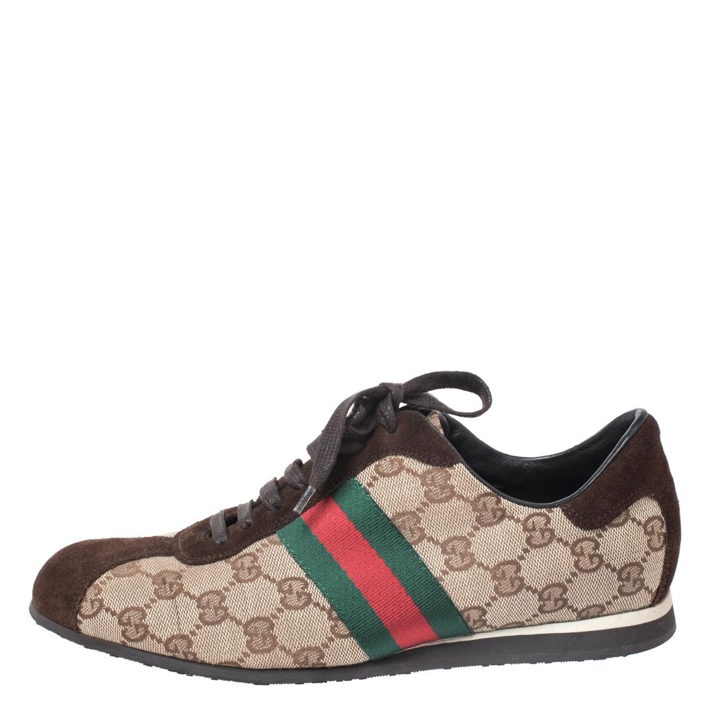 Step into these Gucci sneakers for instant comfort! They feature the iconic Gucci Web detail and suede trims on the GG canvas exterior. They are lined with leather and finished with lace-ups. Pair these with casuals for a sporty and fashionable