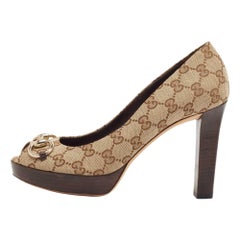 Gucci Beige/Brown GG Canvas Horsebit Peep Toe Platform Pumps Size 39
