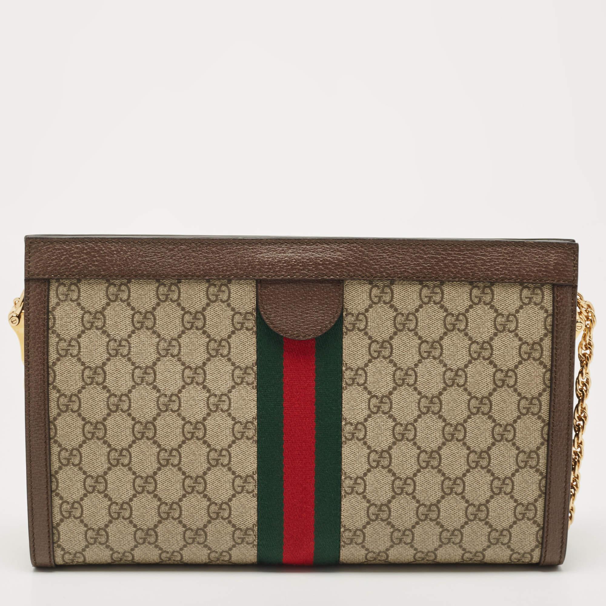 Every creation from Gucci is noteworthy for its timeless charm and versatile design. Created from GG Supreme canvas and leather, this Gucci Ophidia bag is imbued with heritage details. The Web stripe detailing and the interlocked 'GG' motif on the