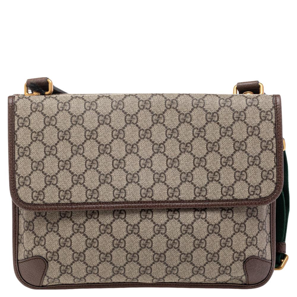 Crafted from signature GG Supreme canvas and leather, this Neo-Vintage bag from Gucci is designed with minimal style details but with high attention to craftsmanship. The spacious interior of the bag is lined with canvas and secured by a flap