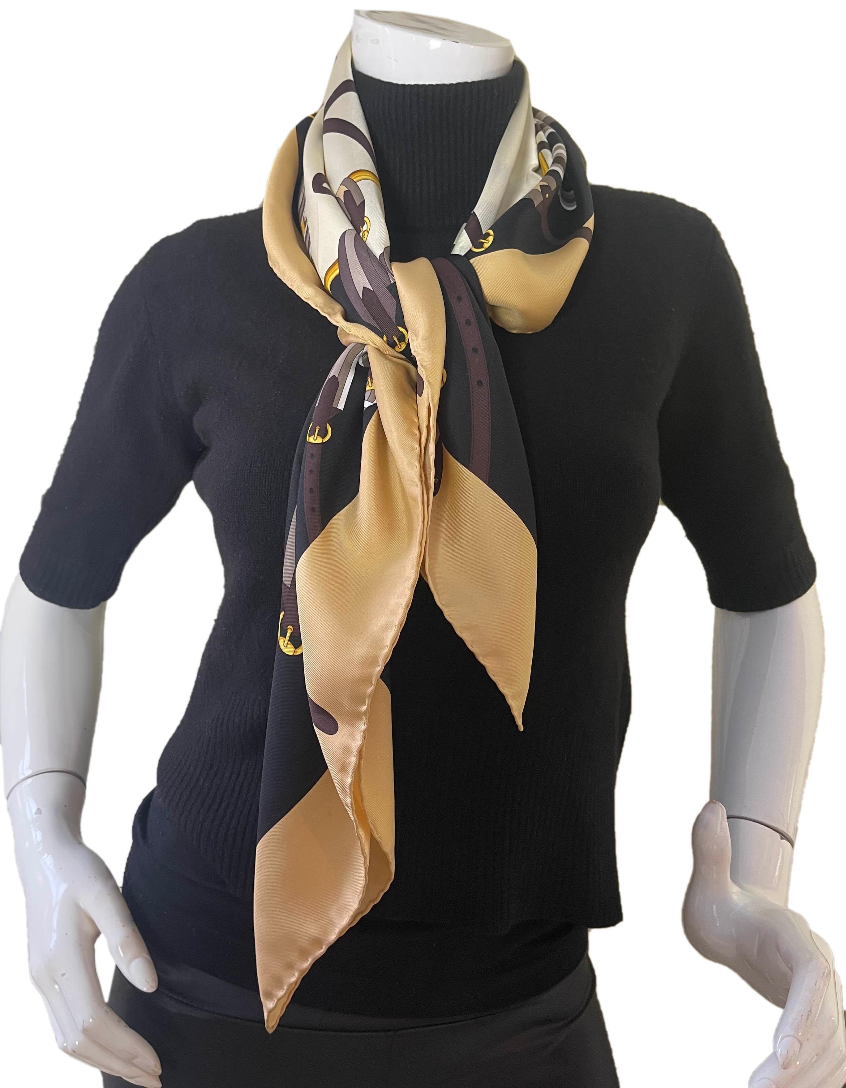 Gucci Beige/Brown/Gold Buckle Print 90cm Silk Scarf

Color: Beige and multicolor
Materials: Silk
Overall Condition: Very good- small stain (see last photo).  Missing tag.

Measurements: 
35”W x 35”H
