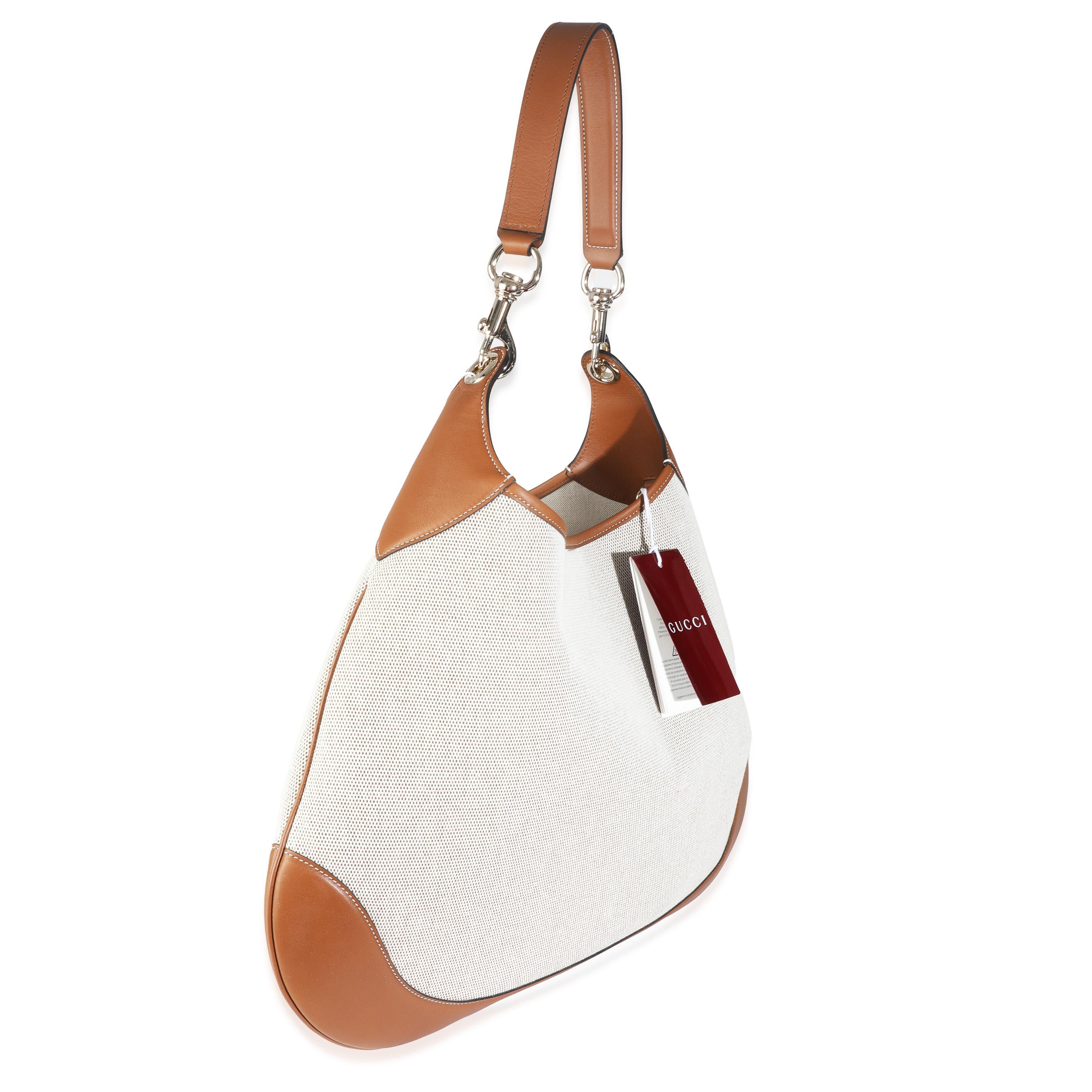 Listing Title: Gucci Beige Canvas Medium B Shoulder Bag
SKU: Z147062
Condition: Pre-owned 
Handbag Condition: Pristine
Condition Comments: Item has no indication of wear. Final sale.
Brand: Gucci
Model: Medium B Shoulder Bag
Origin Country: