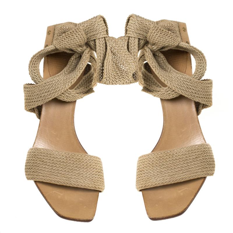 You'll find excuses to wear these gorgeous beige sandals from Gucci, that are all about high style! These sandals are designed using cotton blend straps. They feature single vamp straps, ankle wraps and 11 cm heels.

Includes: The Luxury Closet