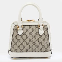 Borsa Gucci Beige/Crema GG Supreme in tela spalmata e pelle Mini Horsebit 1955