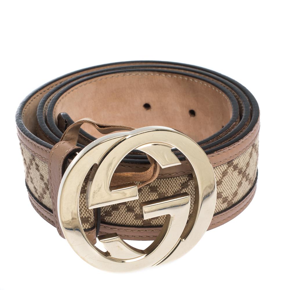 Light up your belt collection by adding this buckle belt from Gucci. Made from beige Diamante canvas and leather, it features the iconic interlocking G buckle in gold-tone, accompanied by a single loop. This belt will look ideal with