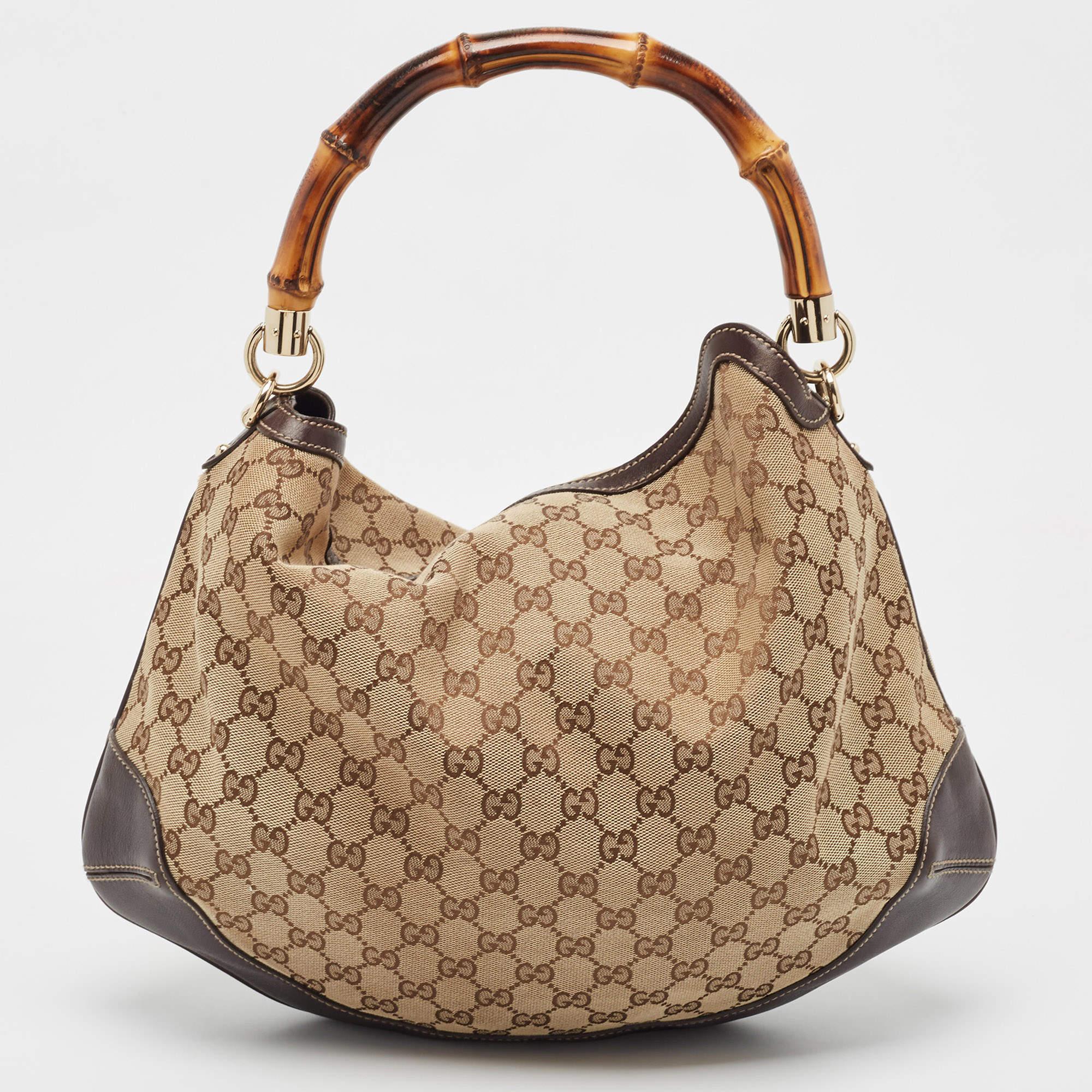 With a Gucci bag by your side, it's going to be a stylish OOTD, no matter the day. Here, we have this Gucci Bamboo shoulder bag just for you. Its spacious shape, heritage details, and simple elegance make it a worthy purchase and a versatile
