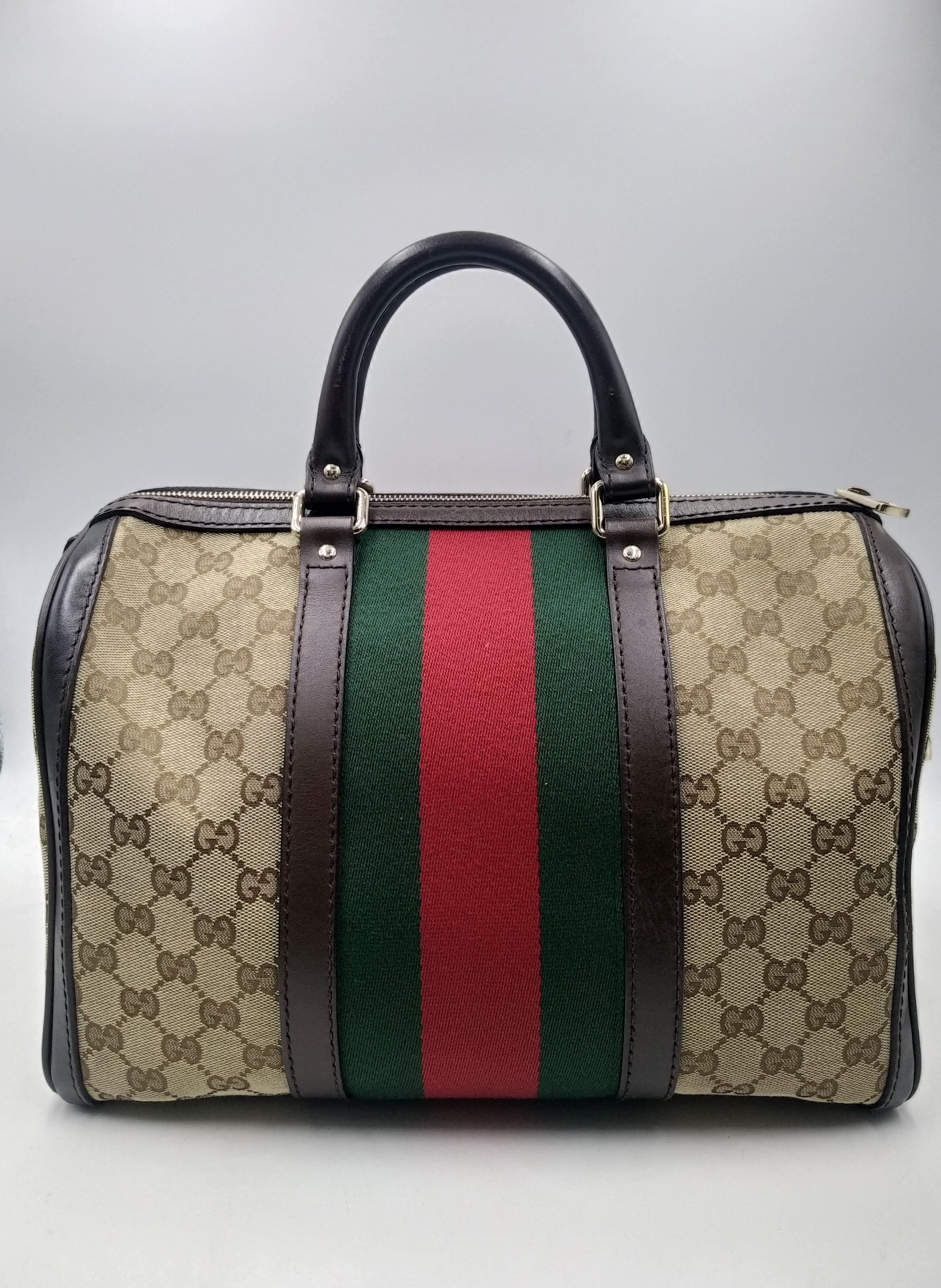 Gucci Beige/Ebony GG Canvas Vintage Web Medium Boston Bag with Shoulder Strap
- 100% authentic Gucci
- Beige canvas with brown leather trim
- Double rolled leather handles and single flat, detachable, adjustable leather shoulder strap
- Single zip