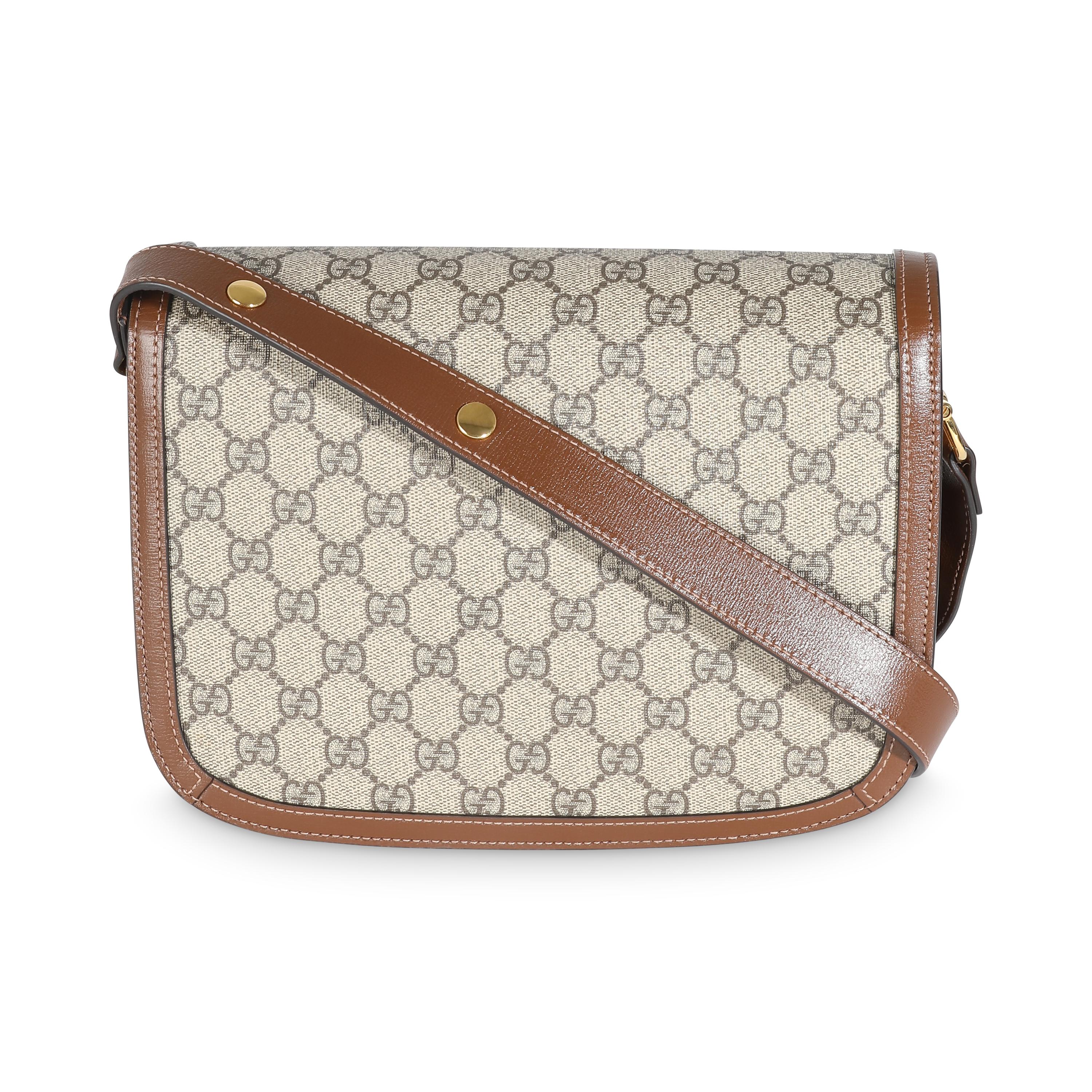 Listing Title: Gucci Beige Ebony GG Supreme Canvas 1955 Horsebit Shoulder Bag
SKU: 141629
MSRP: 3150.00 USD
Condition: Pre-owned 
Condition Description: The Neo Vintage GG Supreme collection from Gucci pays homage to the house’s roots. Designed with