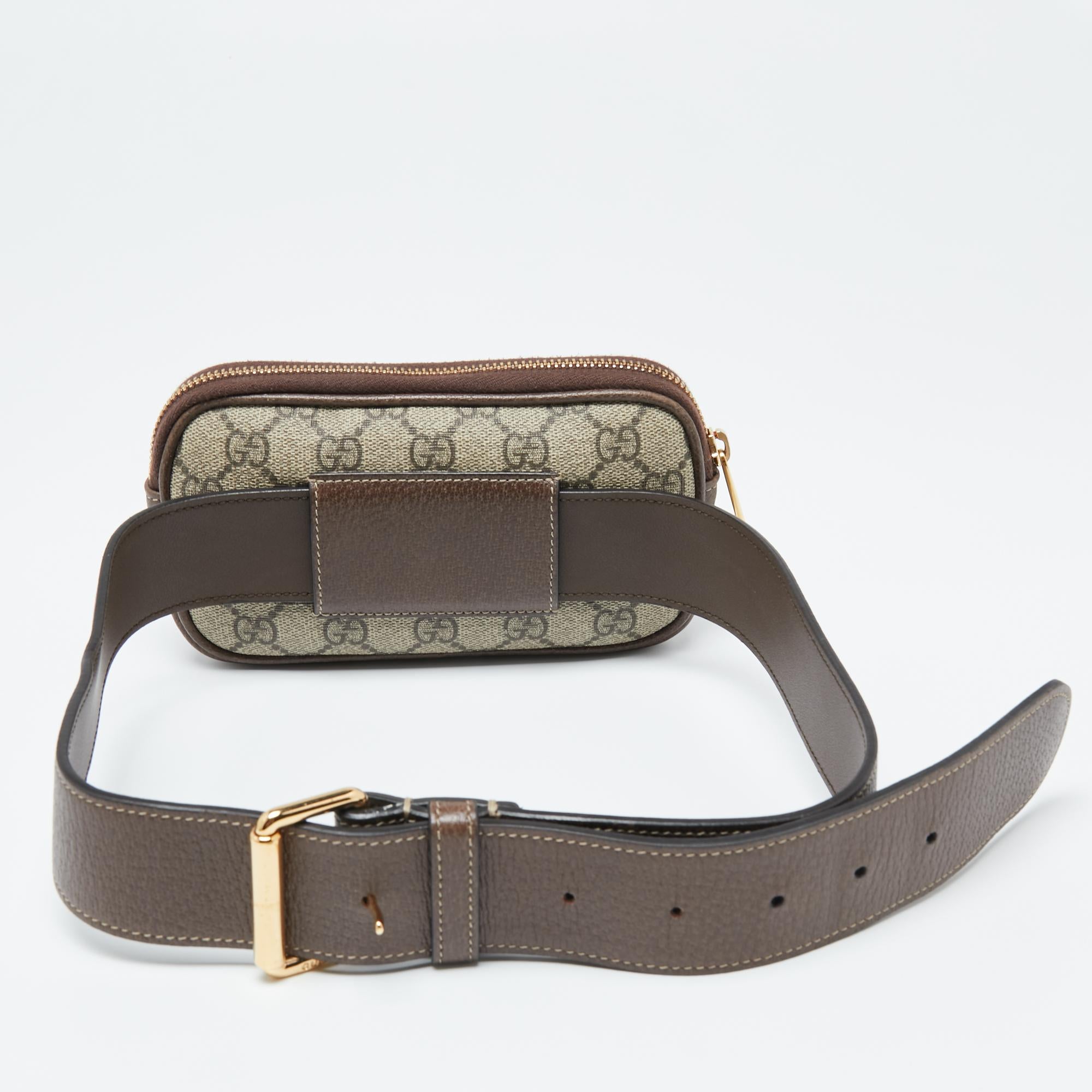 Gucci's Ophidia Belt bag has an appealing design and a functional quality. Constructed using GG Supreme canvas and leather, the bag has the GG logo on the front, a zip-enclosed Alcantara interior, and an adjustable belt.