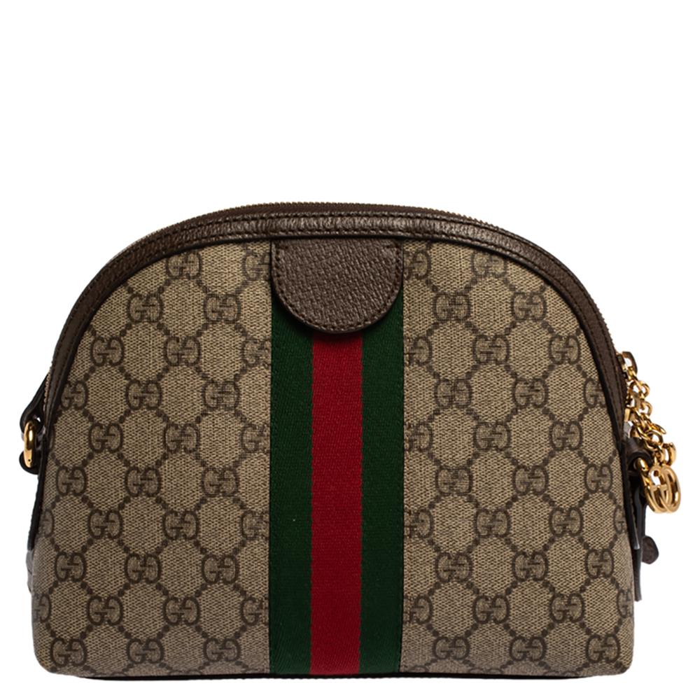 Add to your look by accessorizing with this Gucci bag. Designed expertly, this bag features a GG Supreme coated canvas body that is enhanced with leather trims. The bag flaunts signature GG on the front along with the web detailing. It is held by a