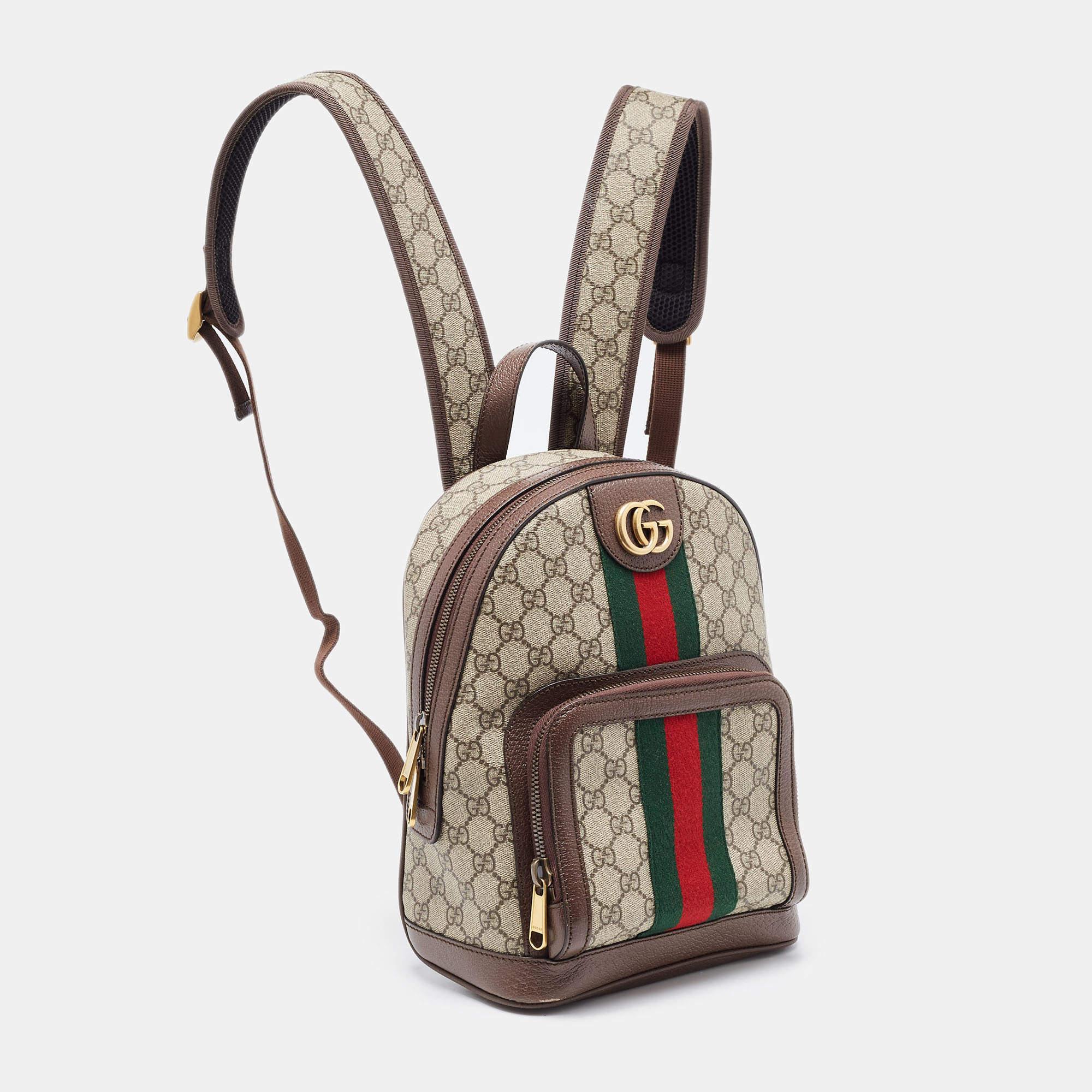 Add to your look by accessorising with this Gucci backpack. Designed expertly, this bag features a GG Supreme coated canvas body. The bag flaunts signature GG on the front along with the web detailing and a zipped pocket. It is held by shoulder