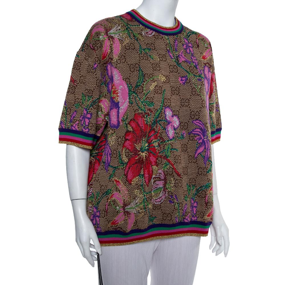 Gucci's sweater exudes the label's poise and timeless charm with its elegant look. Made from a blend of quality materials, it features floral prints all over atop Gucci's monogrammed background and stripe details on the sleeves, hem, and neckline.