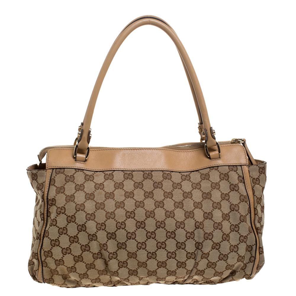 Gucci brings to you this amazing D-Ring satchel that is smart and well-built. It is crafted from GG canvas and leather and features two top handles and a D ring. The top reveals a fabric interior with enough space to hold all your daily essentials.