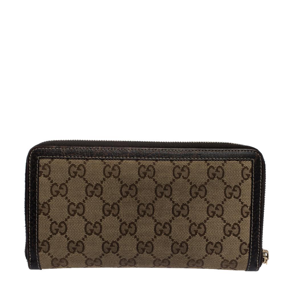 A compact and practical option to store your handy essentials, this Gucci wallet is crafted from GG coated canvas and leather. It has a zip-around closure and is equipped with card slots and a zip pocket to keep things organised. It showcases a