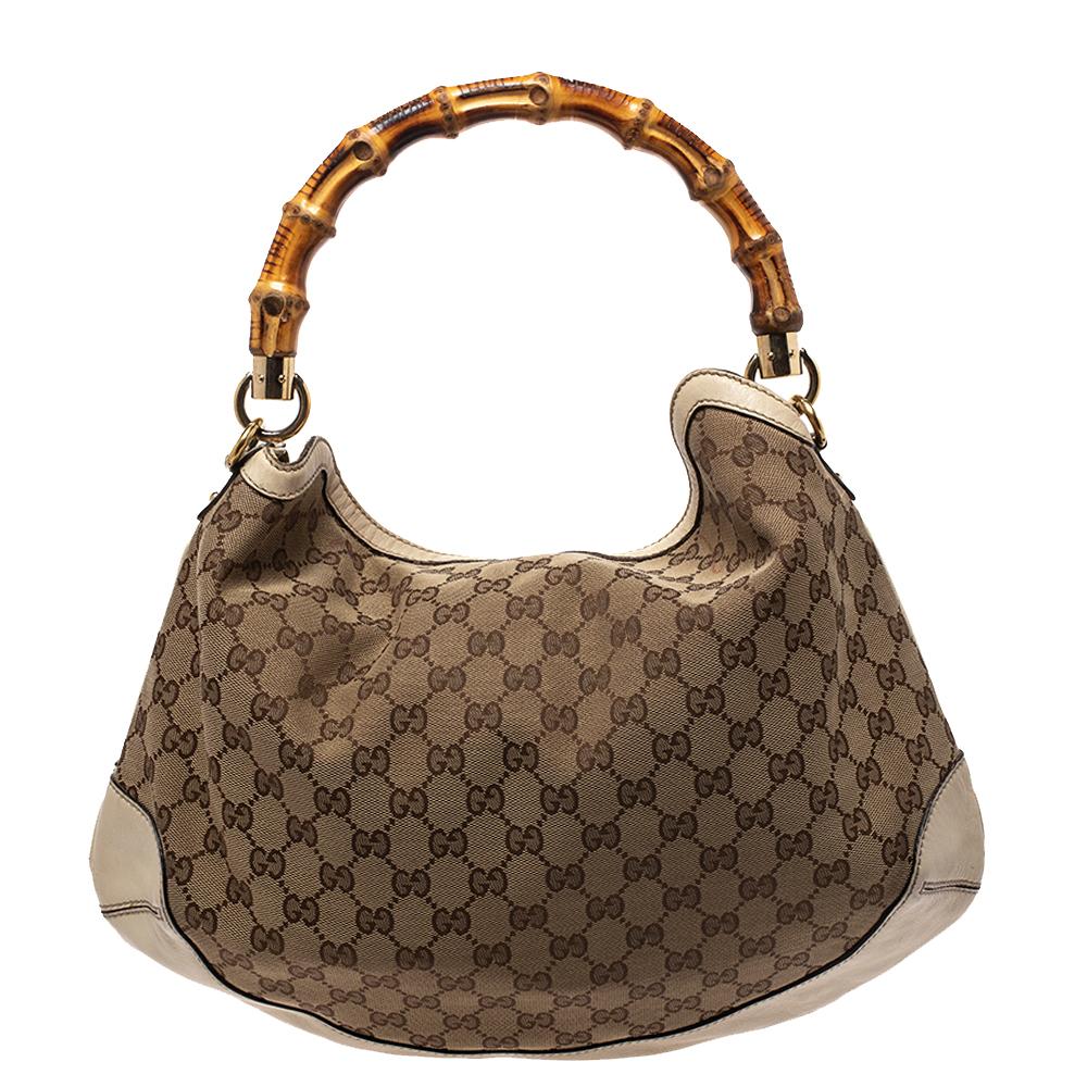Handbags as fabulous as this one are hard to come by. So, own this gorgeous Gucci Peggy bag today and light up your closet! Crafted from GG canvas and leather, this stunning number has a spacious fabric interior and is held by a wonderfully-created