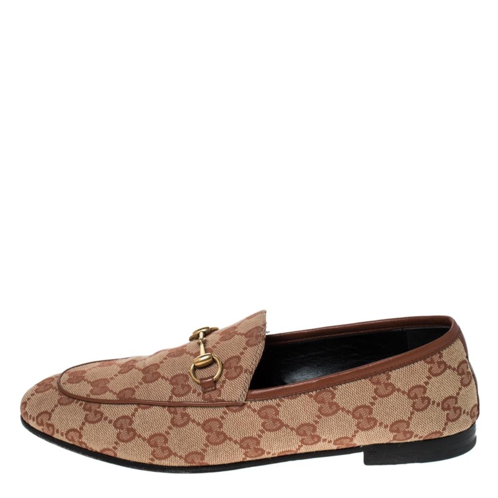Exquisite and well-crafted, these Gucci loafers are worth owning. They've been crafted from GG canvas and they come flaunting a beige shade with Horsebit details in gold-tone on the uppers. The loafers are comfy to wear all day.

Includes: Original