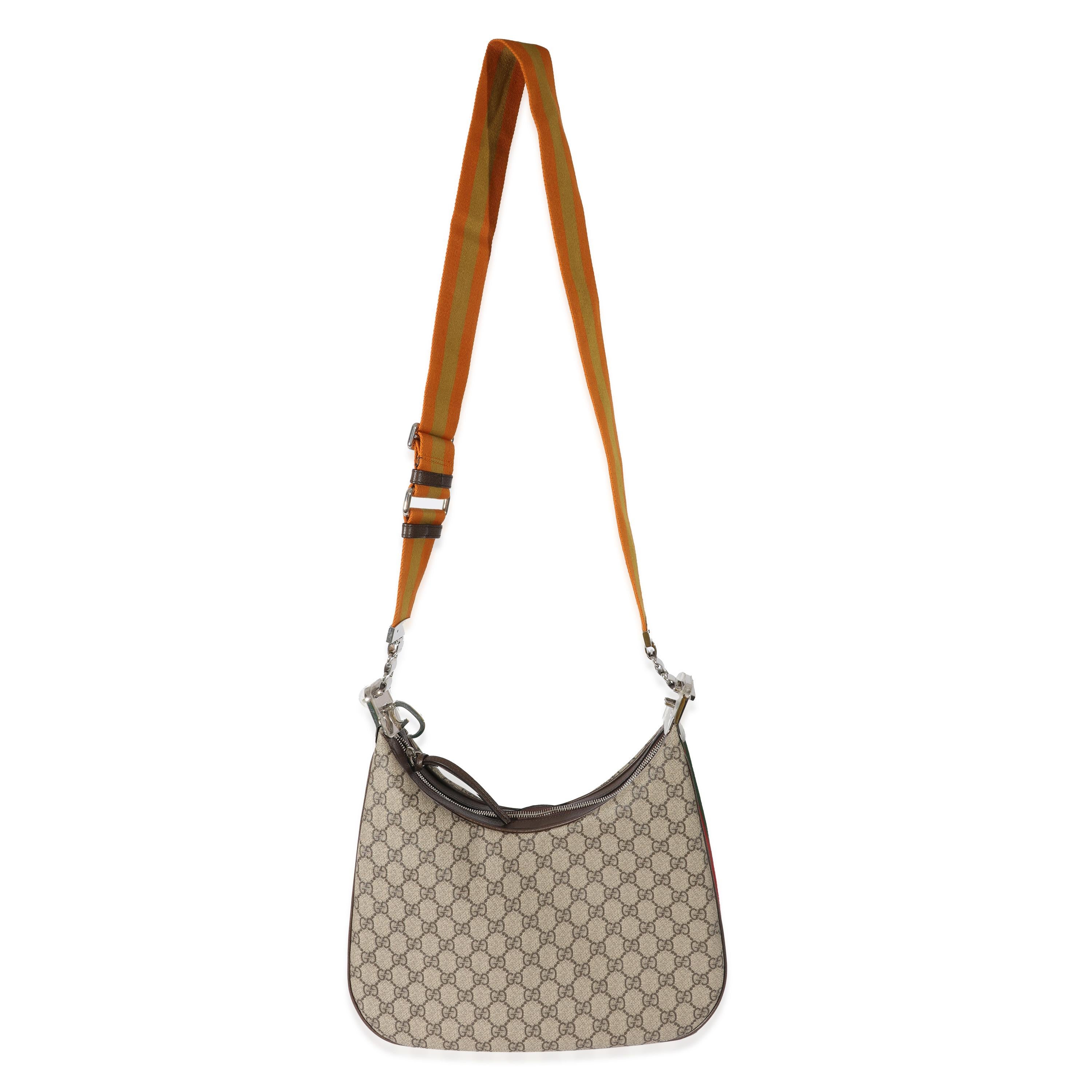 Listing Title: Gucci Beige GG Canvas Large Attache Shoulder Bag
 SKU: 128468
 MSRP: 2980.00
 Condition: Pre-owned 
 Handbag Condition: Excellent
 Condition Comments: Excellent Condition. Plastic on some hardware. No visible signs of wear.
 Brand: