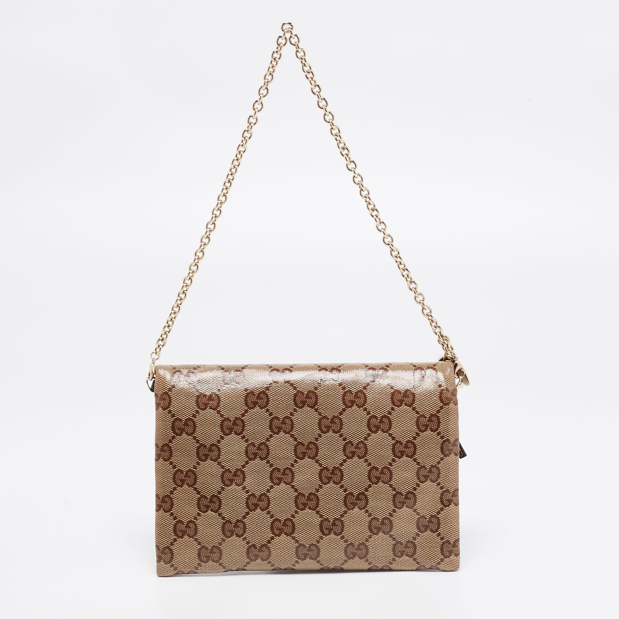 Gucci creations are popular owing to their high style and functionality. This wallet on chain is durable and stylish. Crafted from coated canvas, it can be paraded using the slender chain strap. It is complete with a front flap that reveals a