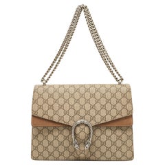 Dionysus small rectangular bag in GG Supreme and taupe suede