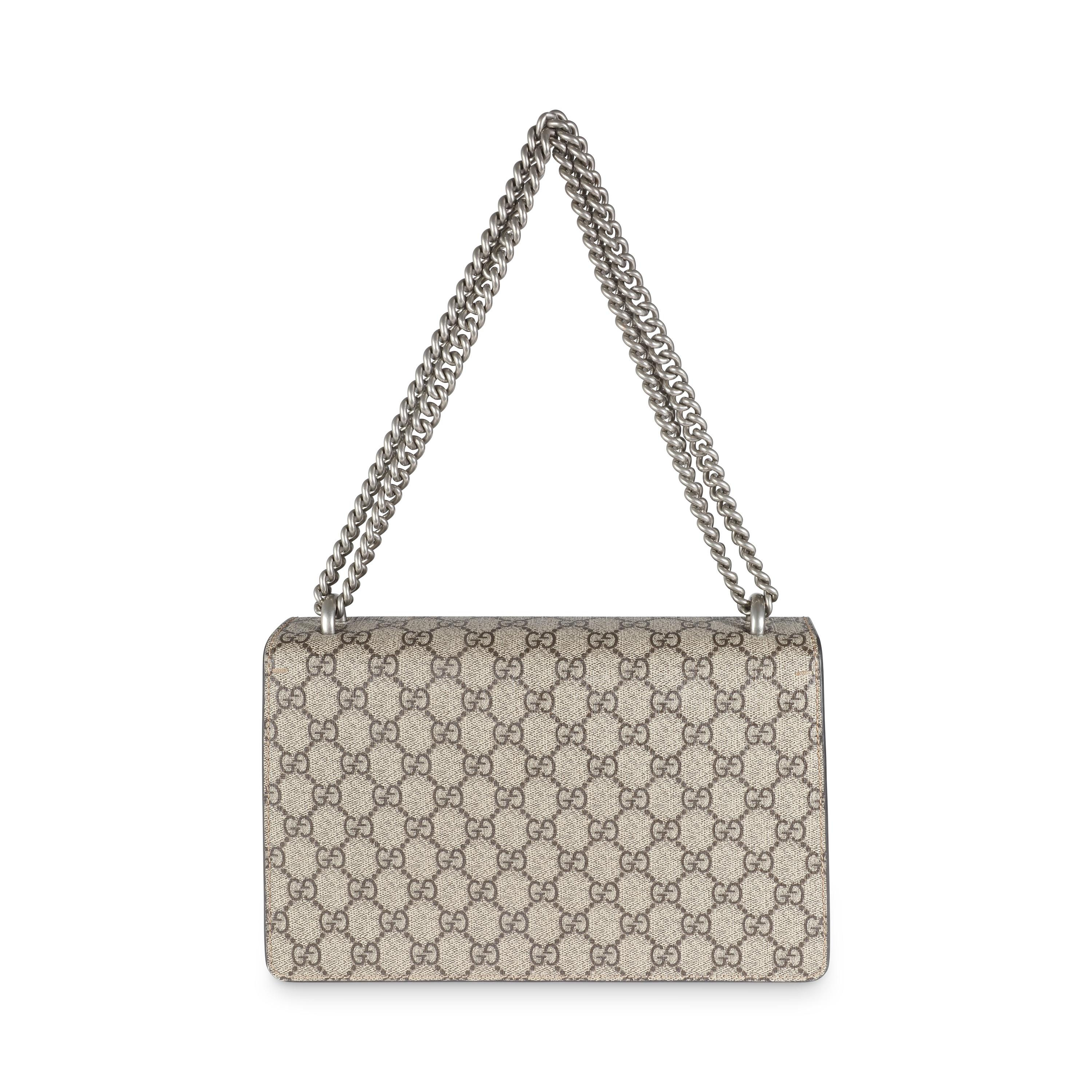 Listing Title: Gucci Beige GG Supreme Canvas Small Dionysus Bag
SKU: 141425
Condition: Pre-owned 
Condition Description: Taking the fashion sphere by storm in 2015, the Dionysus crossbody bag from Gucci was given its moniker after the Greek god of