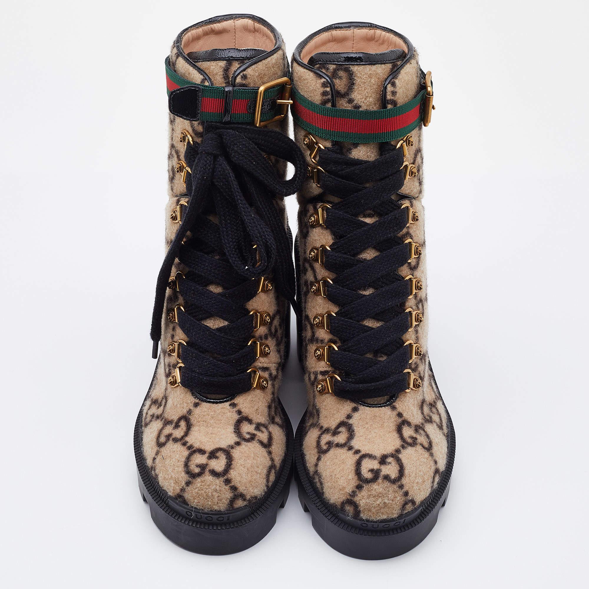Gucci's love for creating statement-making designs is beautifully displayed on this pair! Constructed using GG wool, the boots are secured with black laces, lined with leather, and elevated by chunky block heels. A Web belt strap seals the look of